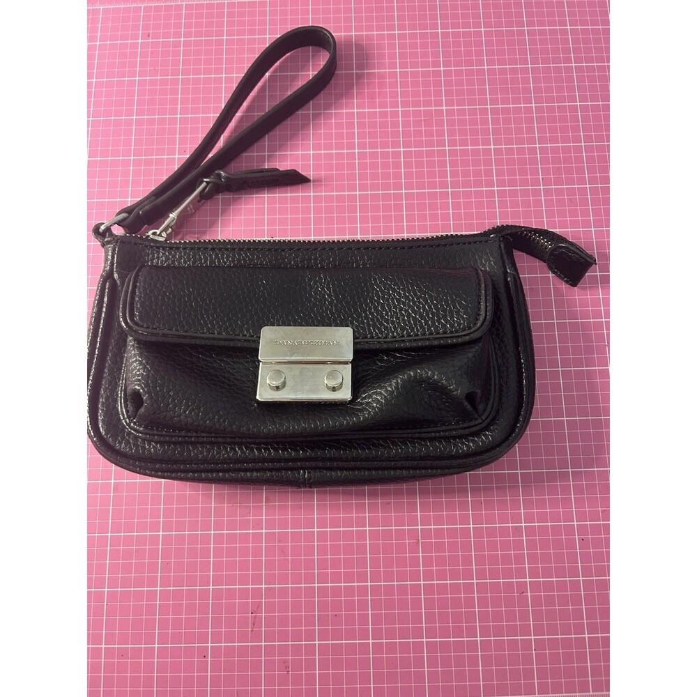 Dana Buchman black faux leather clutch wristlet with silver-tone hardware.
